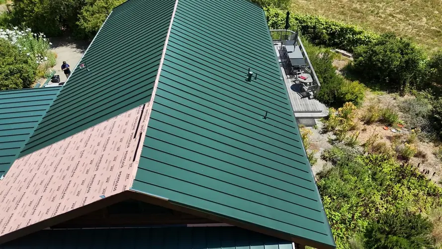 Green metal roof installation on a classic Victorian home in San Francisco’s Pacific Heights neighborhood